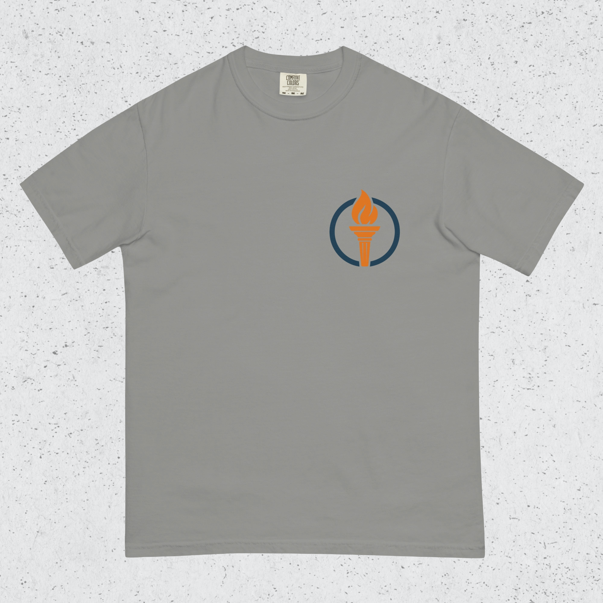 A grey FFF tshirt on a grey speckled background.